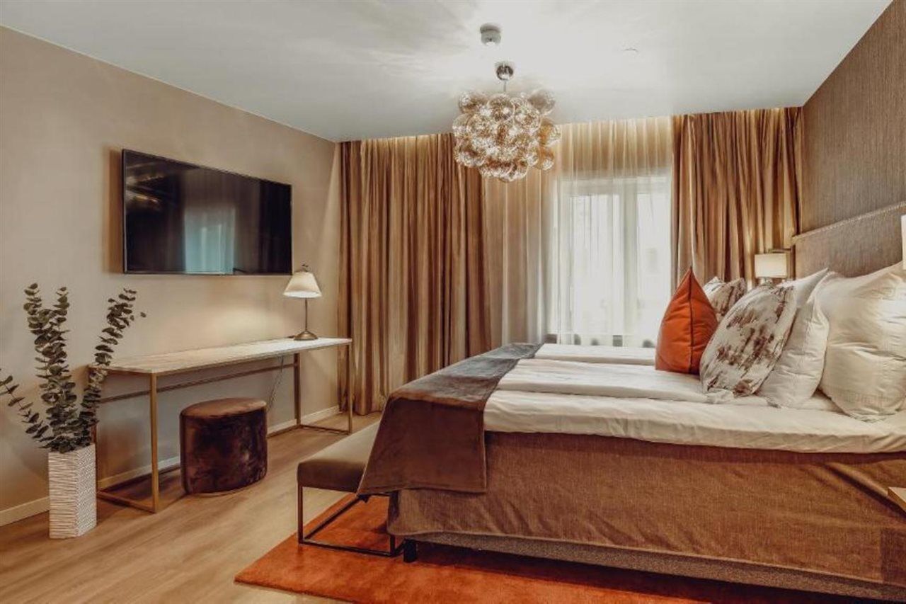 Home Hotel Grand Bodo Luaran gambar